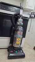 Front view of the Bissell Cleanview Helix upright vacuum showing model and turbo brush.
