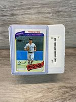 Photo of 1980 Topps baseball card showing Fred Lynn of Red Sox and box label stating '1980 Topps 200 Baseball Cards'.