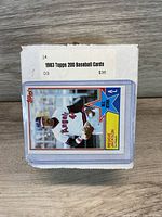 Closed box labeled '1983 Topps 200 Baseball Cards' showing a baseball card featuring Fergie Jenkins in Angels uniform.