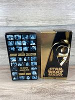 Front of two VHS box collections: Johnny Carson Collection and Star Wars Trilogy Special Edition showing box art and title.