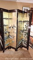 Full view of the 4-panel folding screen showing cranes in golden lagoon scene