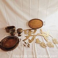 Overview of the lot showing all brass and copper toned items including the tray, Chinese symbols, and animal figures.