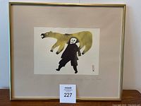 Framed print showing entire artwork with beige mat and gold frame.