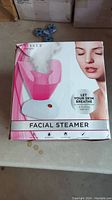 Front of box showing Danielle facial steamer image and basic product claims.