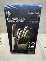 Front of the sealed box of Henckels International EverEdge Plus II 12-piece knife block set showing product image and key features.
