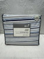Packaged Homebeyond 4 piece microfiber sheet set showing front label with product branding and size (Queen).