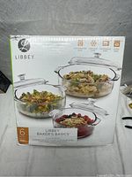 Box front showing the 6-piece Libbey Baker's Basics glass casserole set with 3 casserole dishes and lids.