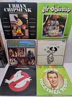 Full lot of six kids records including Urban Chipmunk, Mr Dressup, Sesame Street, Snoopy's Christmas, Ghostbusters, and Mister Rogers albums