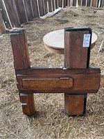 Full front view of the solid wood foundry mold pattern with visible wear and bird droppings. Shows the complex shape and drawer-like section.