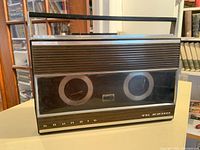 Front view of the Grundig TK 2200 showing dual reel cassette and brand/model markings