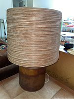 Full view of lamp showing base and shade