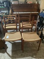 Overview of all six chairs in front of piano