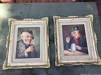 Both ornate framed oil paintings of elderly men side by side showing their fronts.