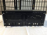 Front panel view showing dual channel equalizer sliders, level faders and control layout