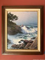 Frontal view of the framed painting showing full artwork and frame