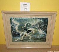 Full view of the framed "Dying Swan" print by Tretchikoff, showing the entire image and beige frame.