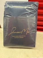 Front view of the robe packaging with SlumberMee branding and tagline 'Nobody Really Matters But You You Deserve the Best'.