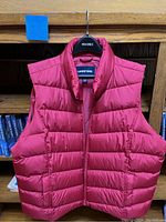 Front view of red Lands' End down-filled vest