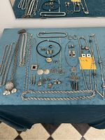 Overview of all items laid out on blue tablecloth