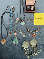 Full lot overview on blue background showing all eleven pieces