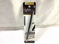 Front view of L'Oreal Infallible 511 Black Mechanical Eyeliner in original unopened blister package.