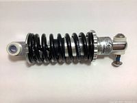Full side view of new KS 260 coil spring rear shock absorber for small bike.