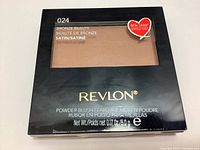Front of the Revlon Bronze Beauty Satin Powder Blush compact showing packaging and product color.