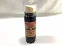 Front view of Revlon Photoready Insta-Filter foundation showing product label and sponge applicator.