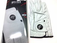 Photo of packaged and unpackaged white Callaway Opti Flex golf glove showing front and side details.