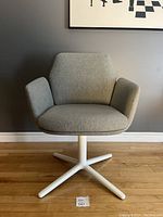 Front view showing upholstery and base