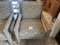 Top view showing fabric pattern and chair seat cushion, labeling with lot number for identification