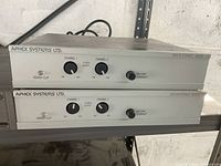 Two Aphex Systems Ltd. 2-channel audio units stacked, showing front panel features.