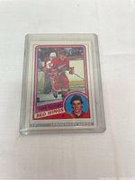 Front view of the Steve Yzerman hockey card in protective plastic case showing the action shot and portrait with team name and player details.
