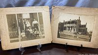 Two mounted antique photographs: one with family portrait on porch stairs and one of the empty two-story double balcony home