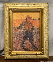 Front image of framed artwork 'The Sower' showing the sower figure in the field with gold painted frame.