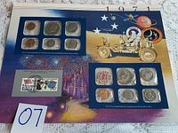 Photo showing the full 1971 U.S. Uncirculated Mint Set folder with coins from Philadelphia and San Francisco Mints and a commemorative stamp.