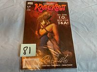 Front cover of Codename Knockout comic book number 0 with autograph and barcode visible.