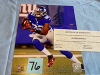 Full 8x10 color photo of Rueben Randle running in Giants uniform with autograph and COA on top