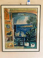 Full view of the glass framed wall art with birds and plants in a colorful abstract style.