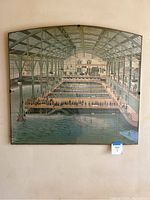 Front view of the large-scale print depicting the interior of the Sutro Baths with plexiglass frame, showing condition and scale.