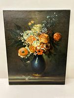 Full view of the oil painting showing floral bouquet in dark blue vase on canvas.