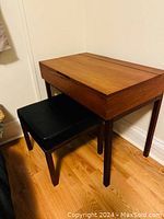 Vanity and stool from angled front, top closed