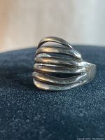 Front view of the vintage sterling silver ring showing the multi-band layered design