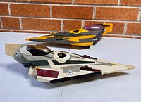 Four Star Wars fighter ship toys showing color and design detail