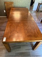 Full view of table assembled with one leaf inserted