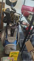 Ping golf bag with clubs