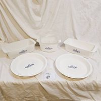 Full view of 5 Corning Ware Blue Cornflower pieces: 2 pie plates, 2 bread loaf pans, 1 covered dish