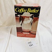 Front view of the original Coffee Butler Thermos box showing vintage style branding and graphics.