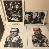 Four music prints with The Who and U2. The Who poster from 2006 Air Canada Center concert in Toronto. Three prints feature U2 band members.