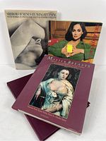 Front covers of four photography books including Mirror of Venus by Wingate Paine and Master Breasts.